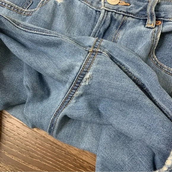 American Eagle women’s skater jeans with distressing throughout 12